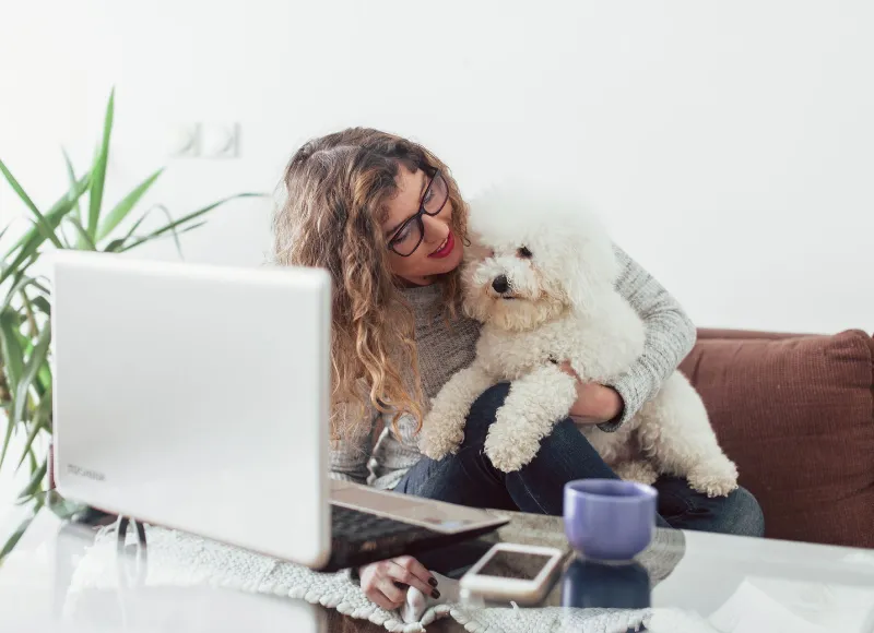 Woman hugging her dog