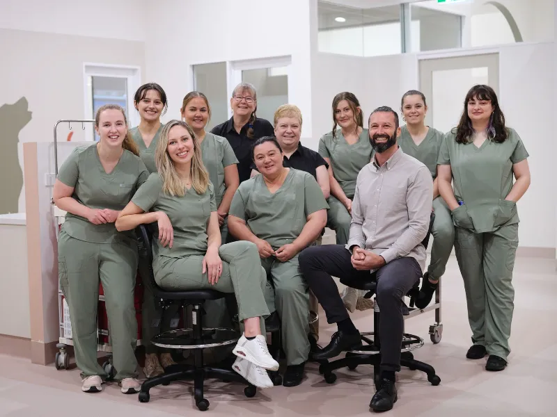Veterinary clinic team photo featured in SVMG branding and healthcare marketing.